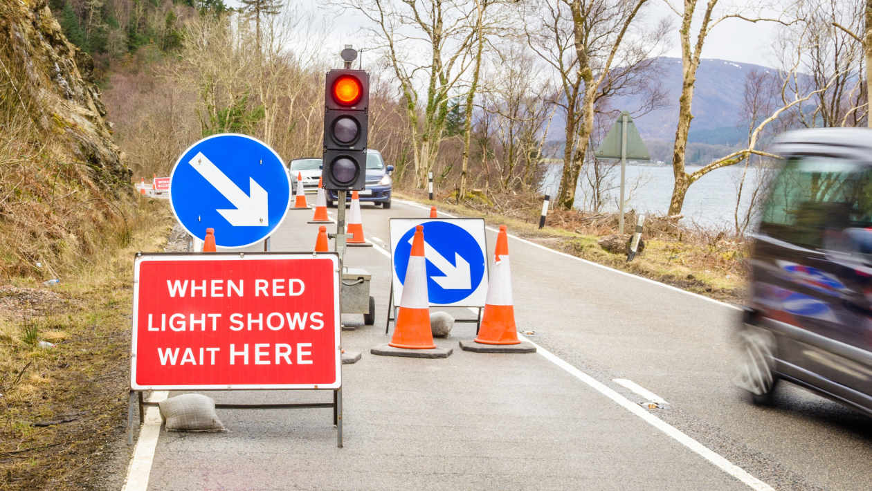 The lights are stuck on red, traffic is building, what should a driver do? | Auto Express